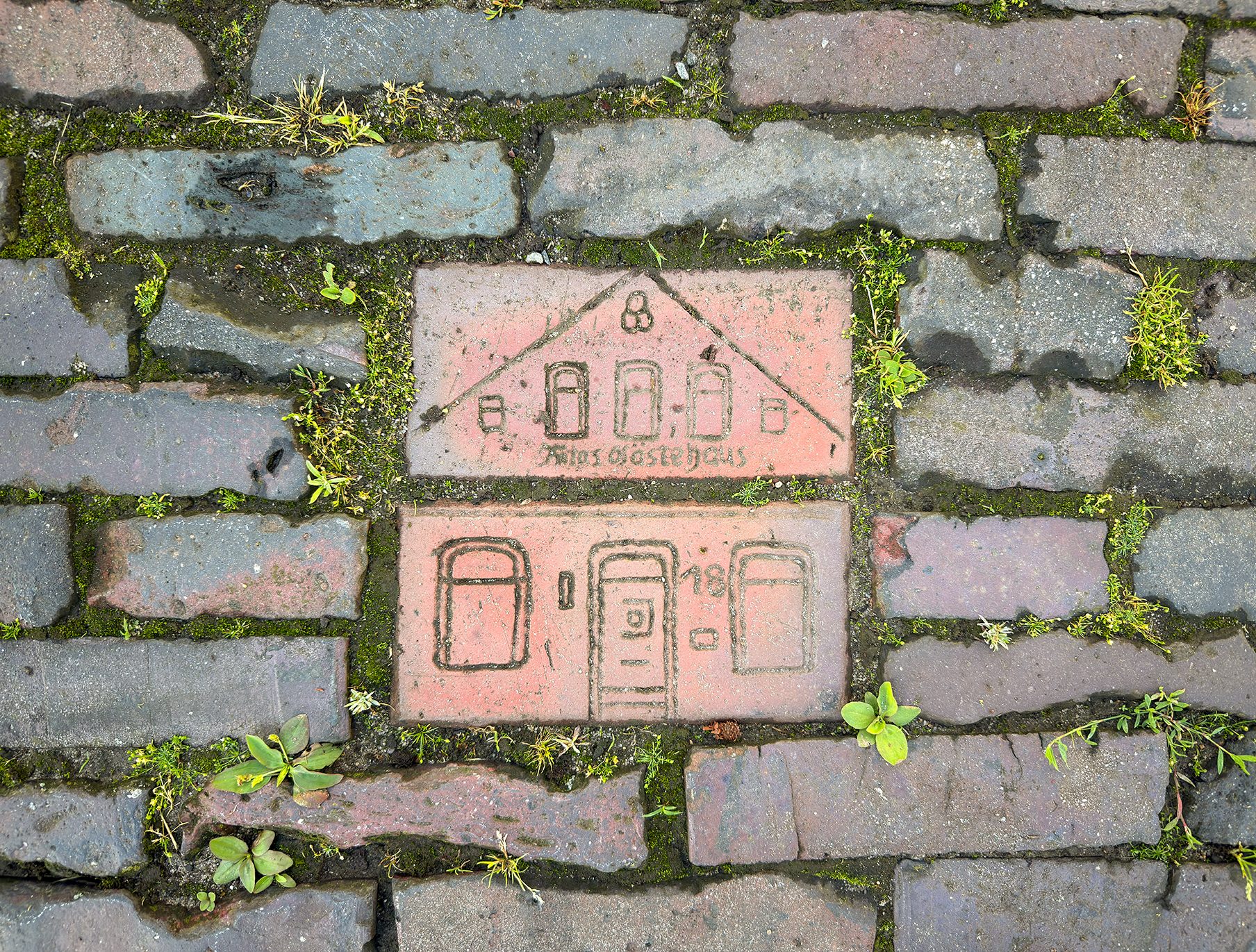 Brick with company or club insignia