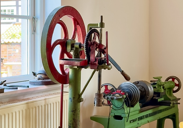 Historic wheelwright's workshop with tools for wagon building