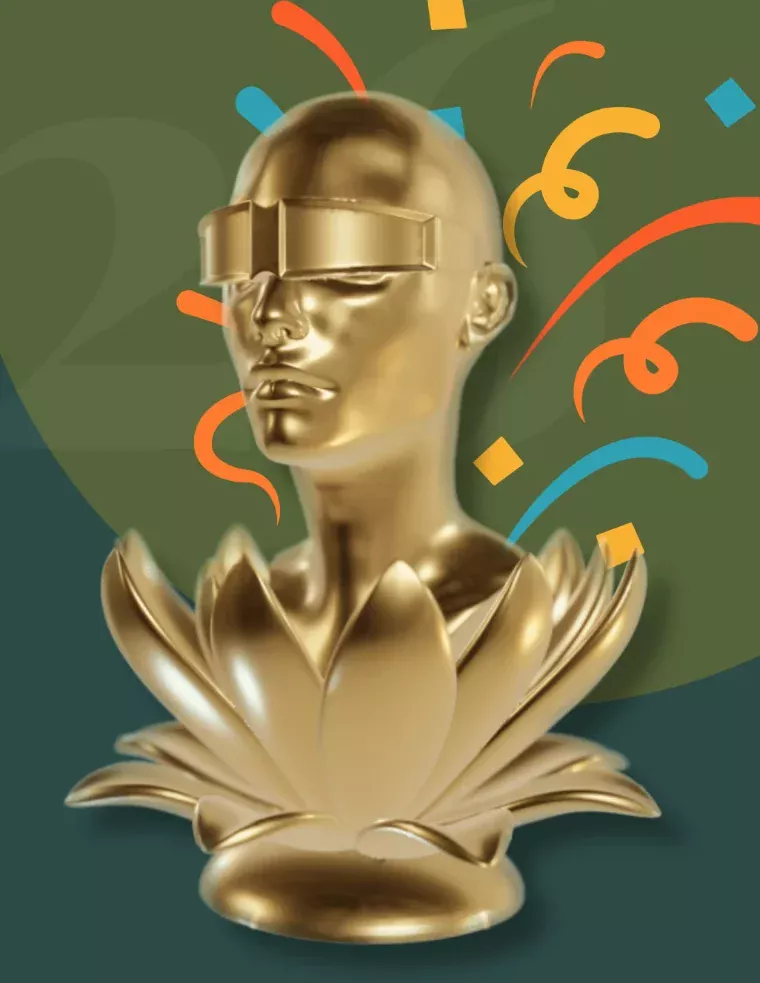 The golden DigAMus Award trophy, a bust on a lotus flower, surrounded by colourful confetti